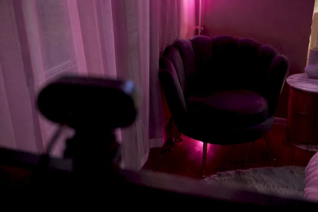 Subtle lighting and framing in private cam room