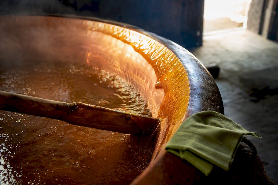 Cane syrup thickening in evaporation pan