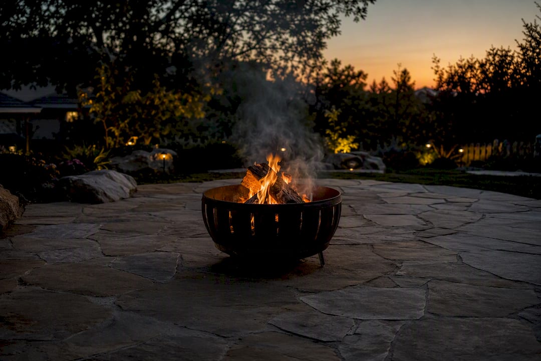 Wood burning fire pit with overhead clearance