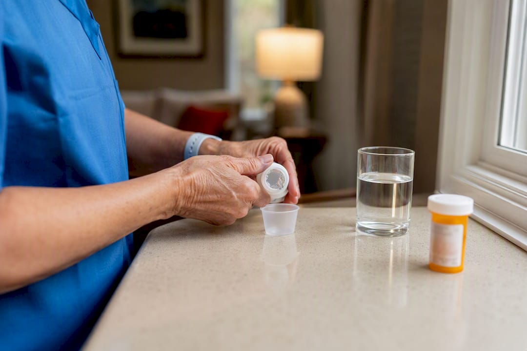 Nurse hands preparing medication at home