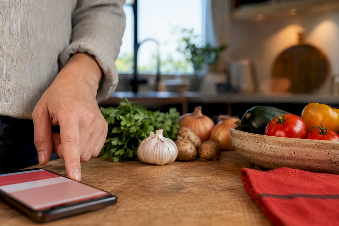 Home cook organizing automated grocery ingredients