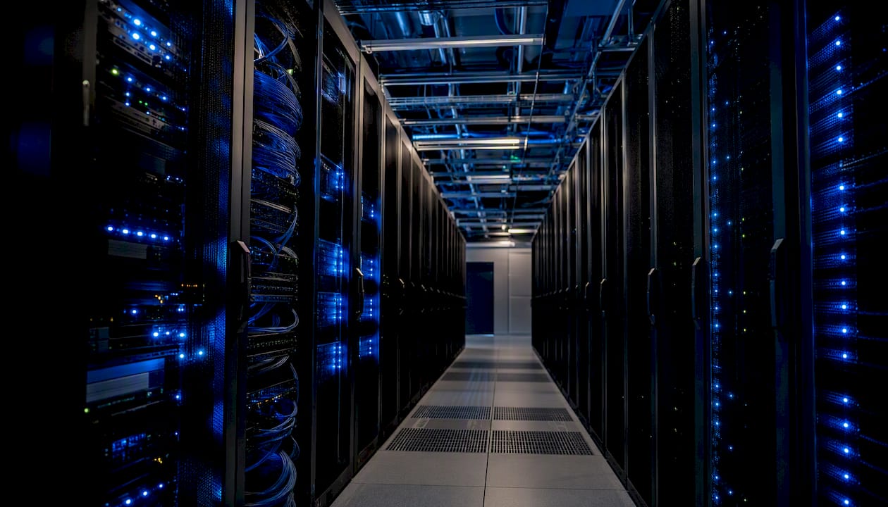 Server racks in data center with blue lighting