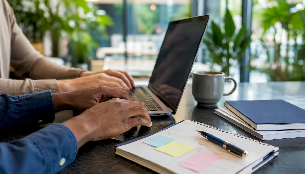 Hands typing in customer support email thread