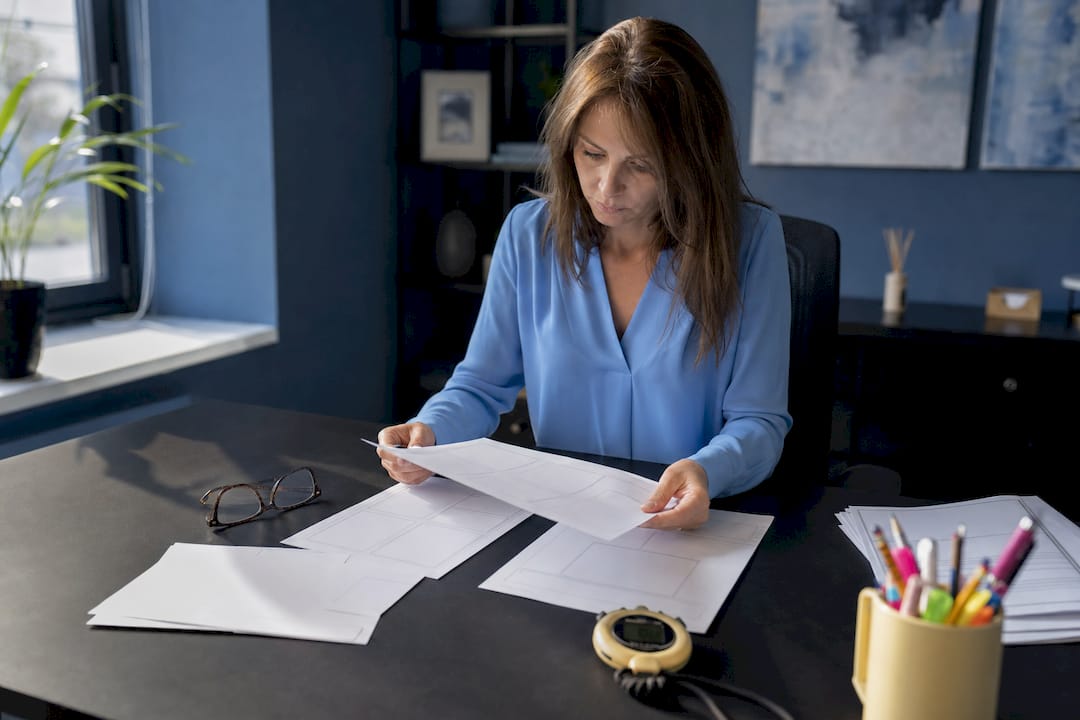 Teacher reviewing GCSE maths exam timing and structure