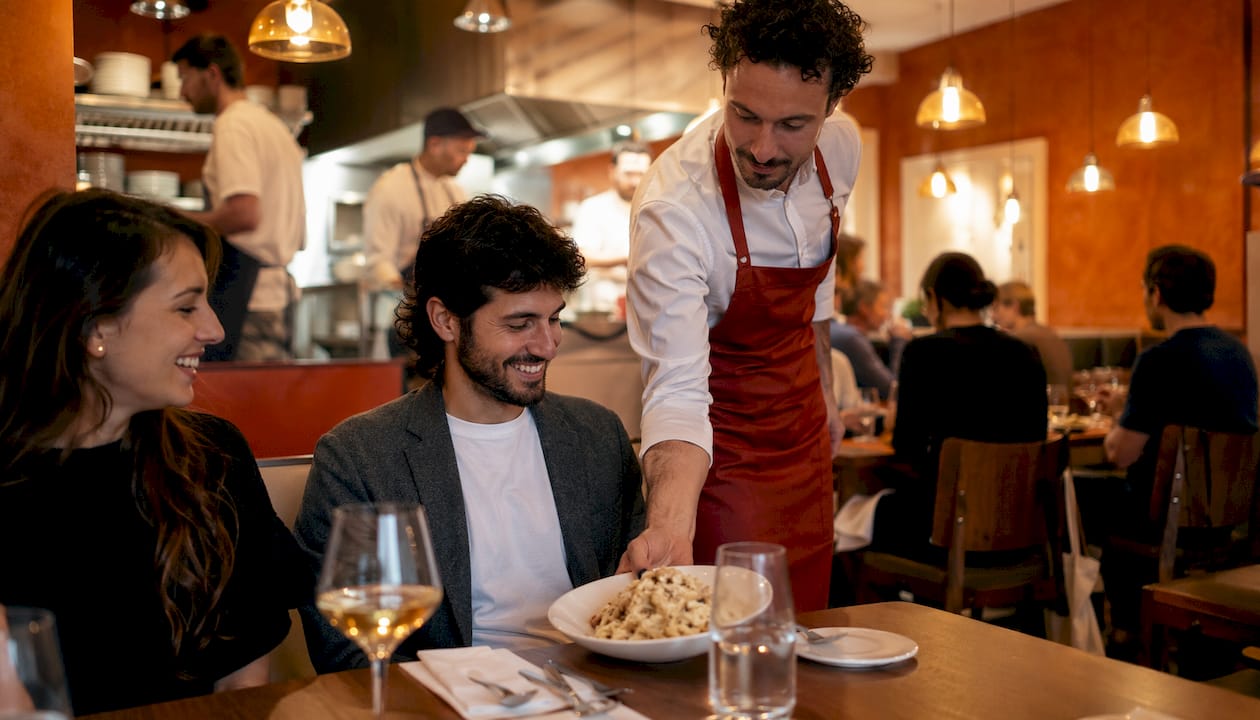 Modern restaurant with plated cacio e pepe dish