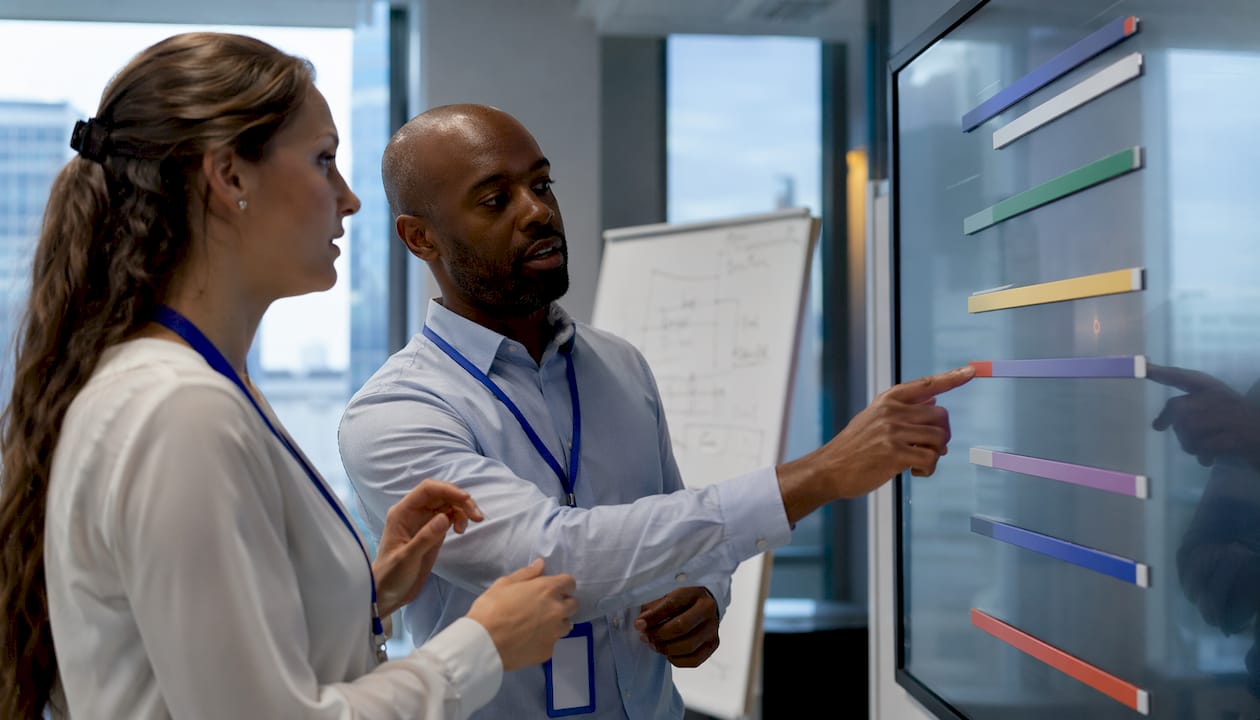 Procurement team applying weighted scoring criteria