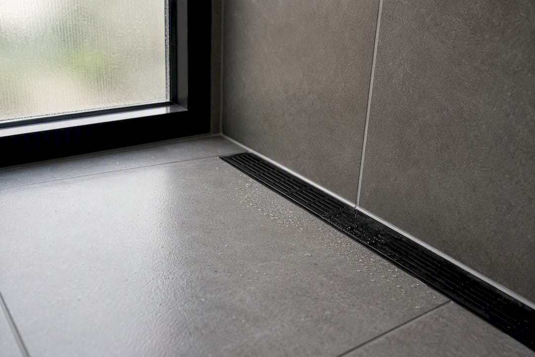 Close-up of wet room drainage and floor slope