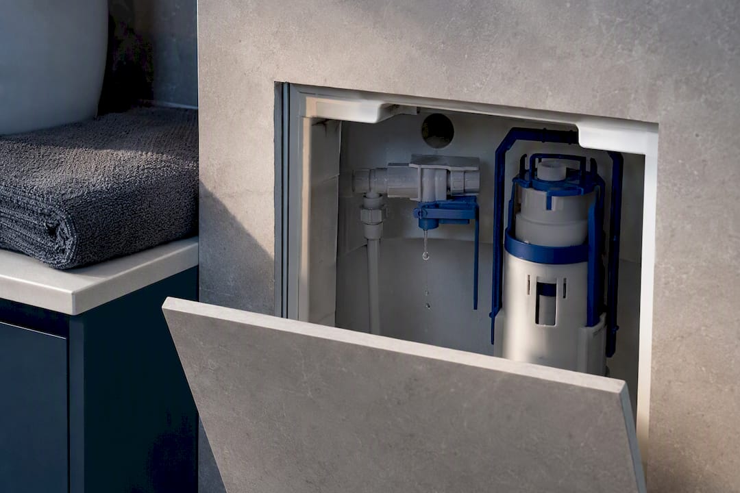 Concealed cistern valve behind access panel
