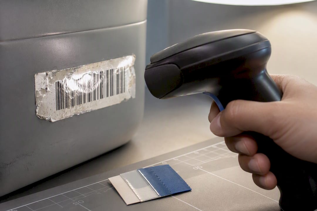 Damaged barcode label tested under directional light