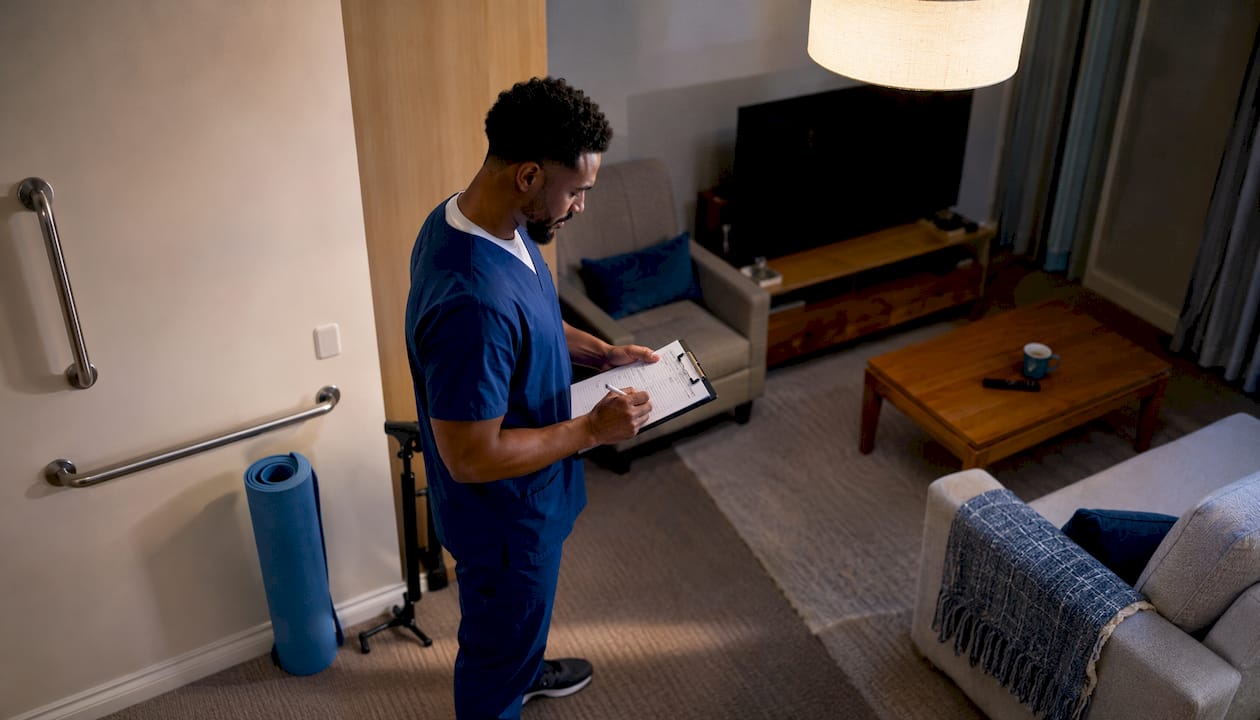 Healthcare worker performing overnight home safety check