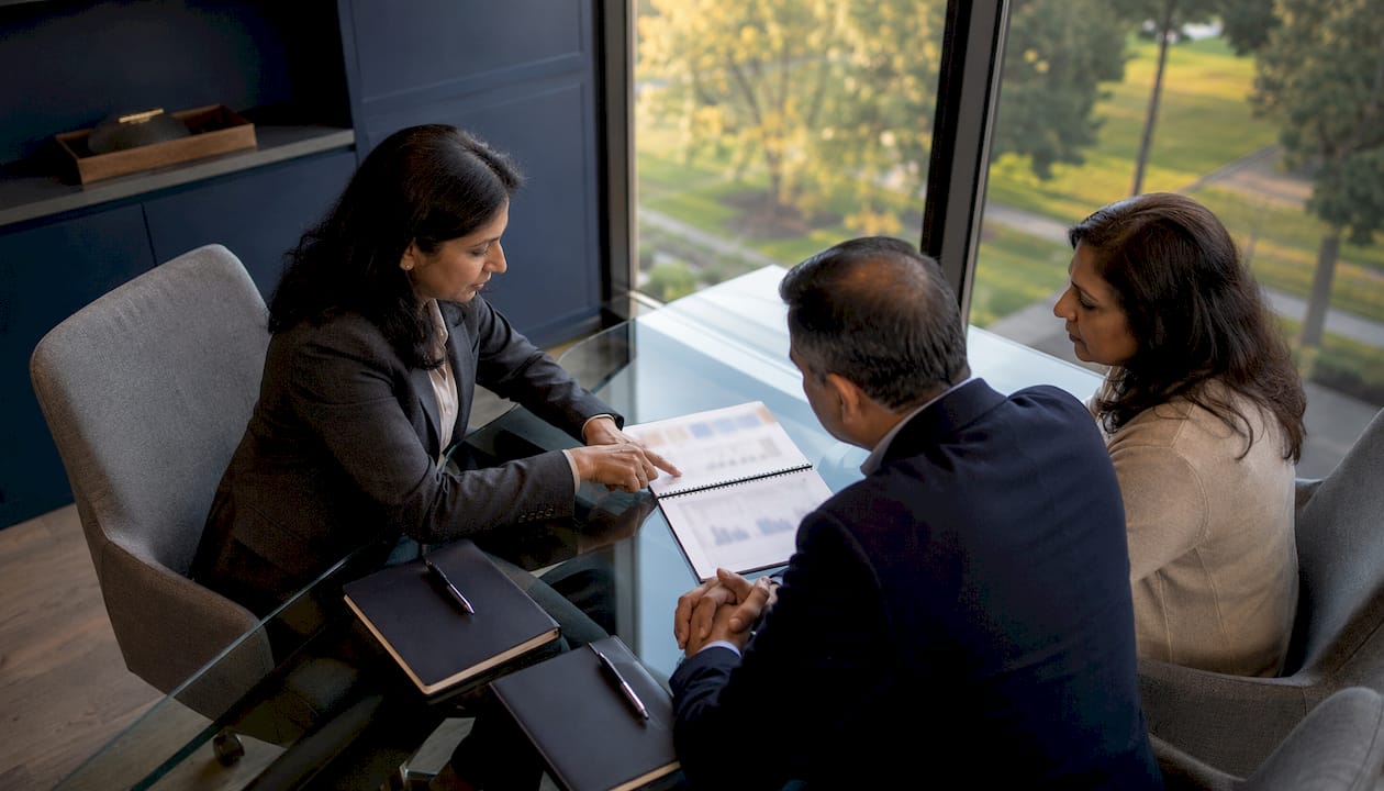 Financial planner discussing retirement risk with clients