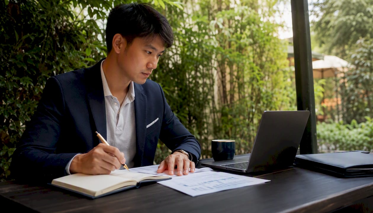 Young man planning retirement finances