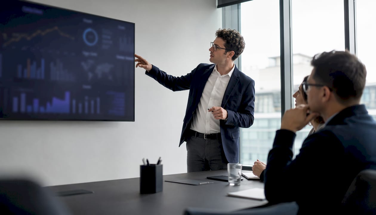 Professional discussing proxy rotation on monitors