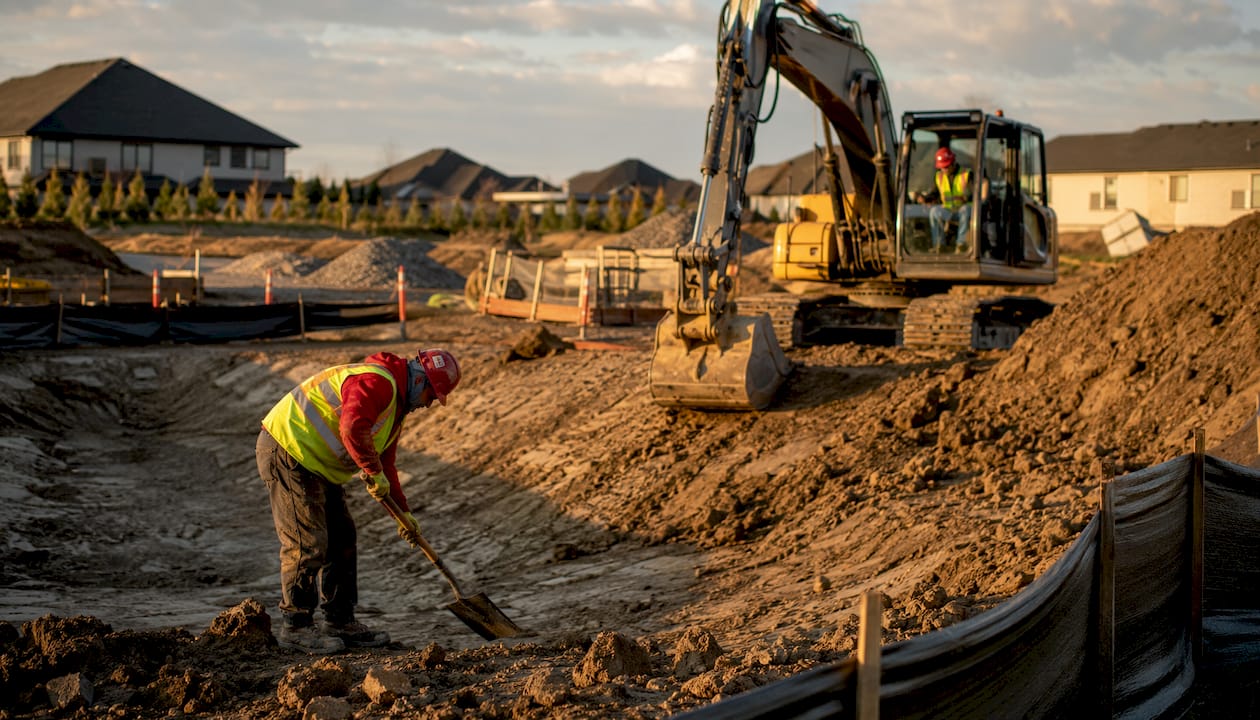Construction of dry detention basin under cloudy skies