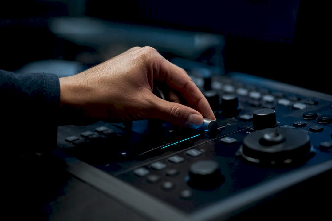 Hand adjusting video timeline scrubber