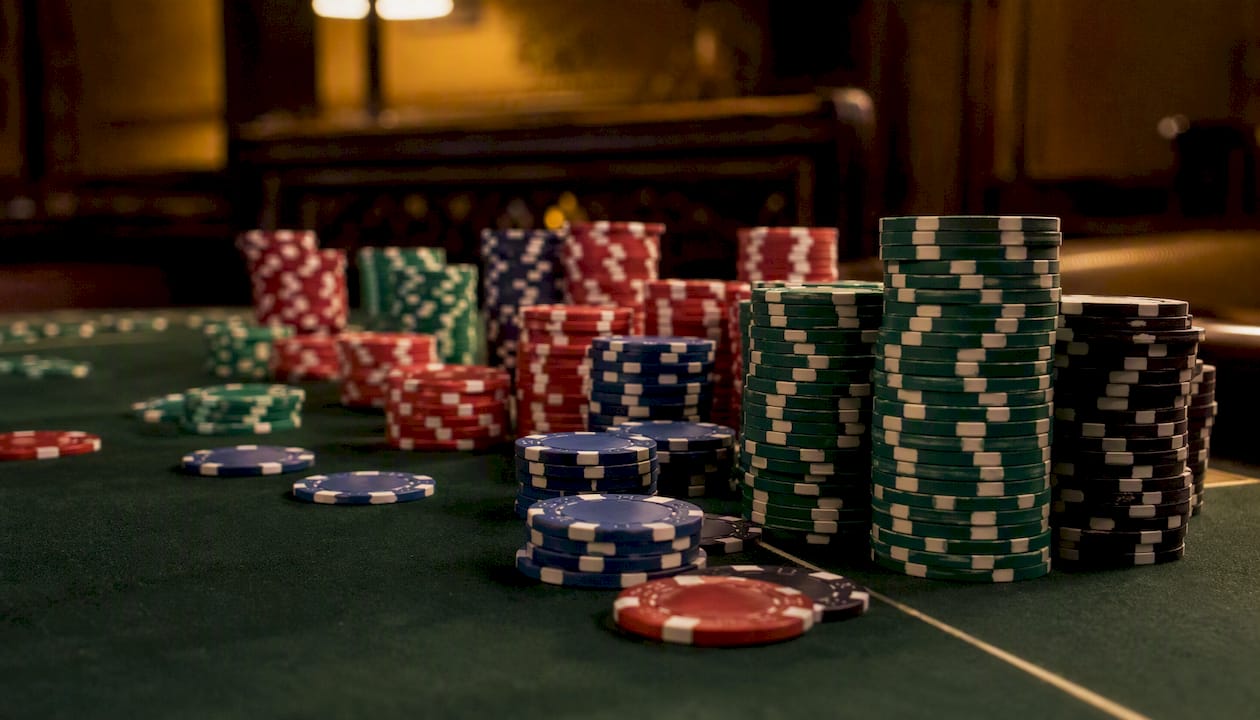 Different poker chip denominations laid out
