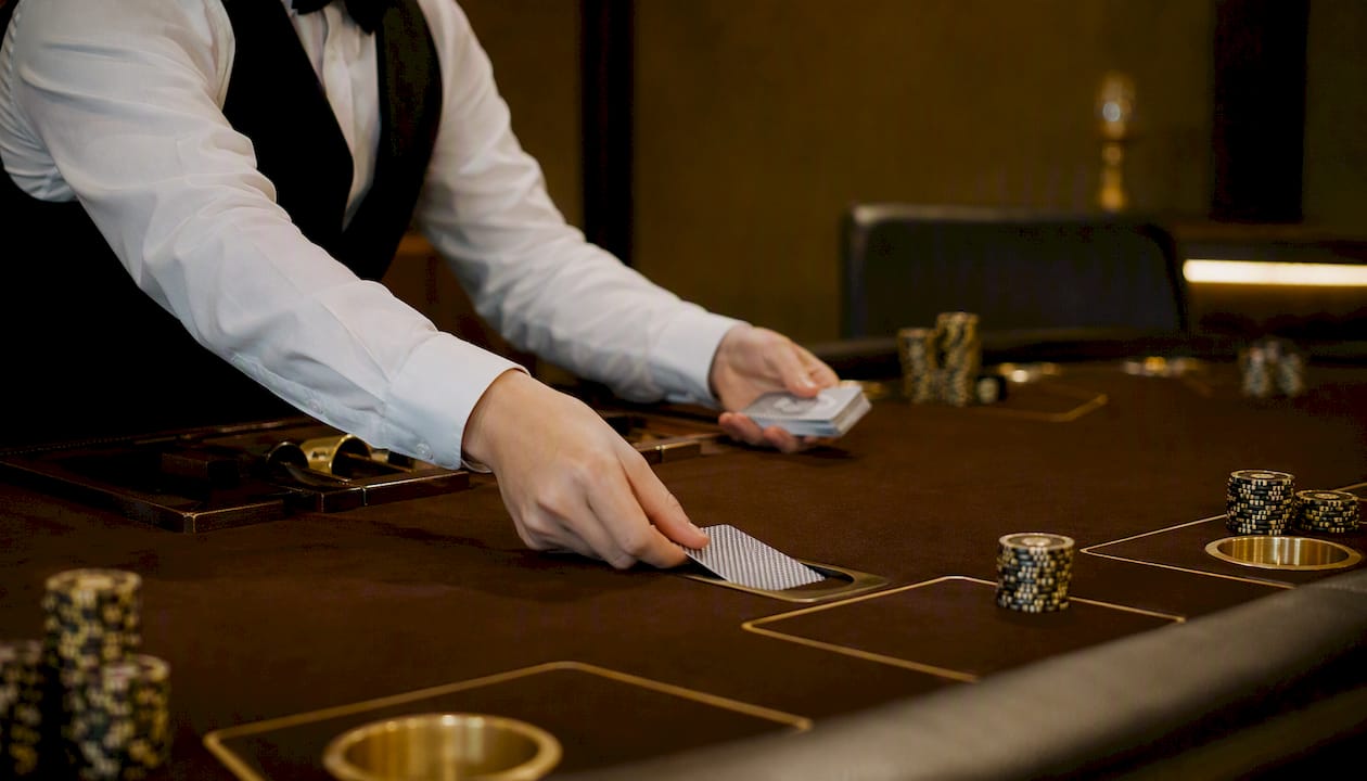 Dealer dealing and killing cards in empty seat
