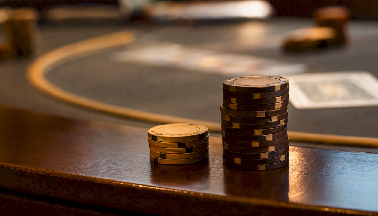 Close-up of small blind and big blind chip stacks