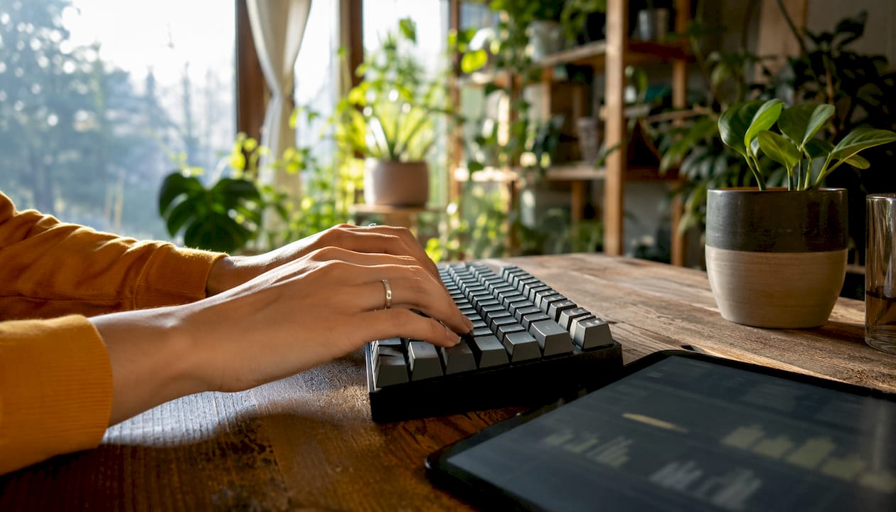 Hands typing AI preferred content formats