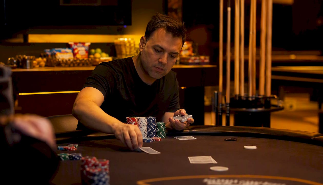 Private poker room with chips and cards