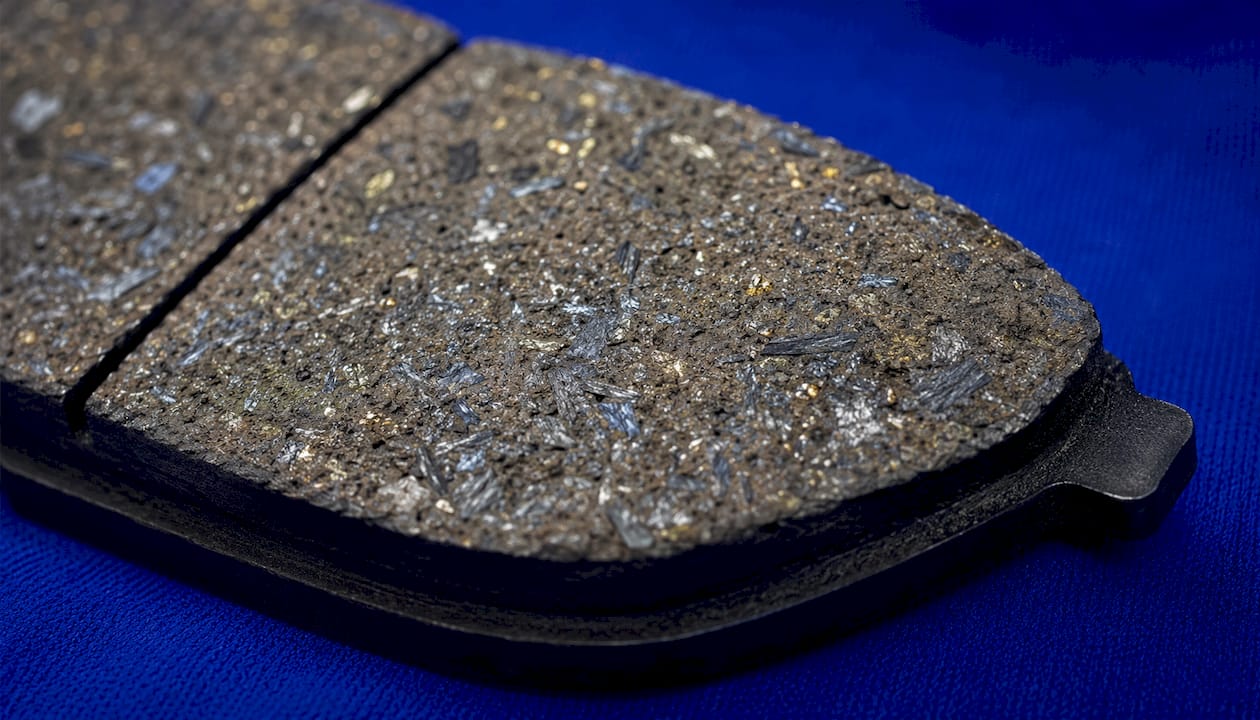 Close-up of semi-metallic brake pad material texture