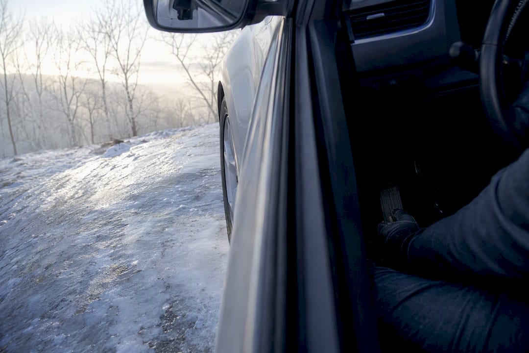 Partial wheel and driver braking on icy slope