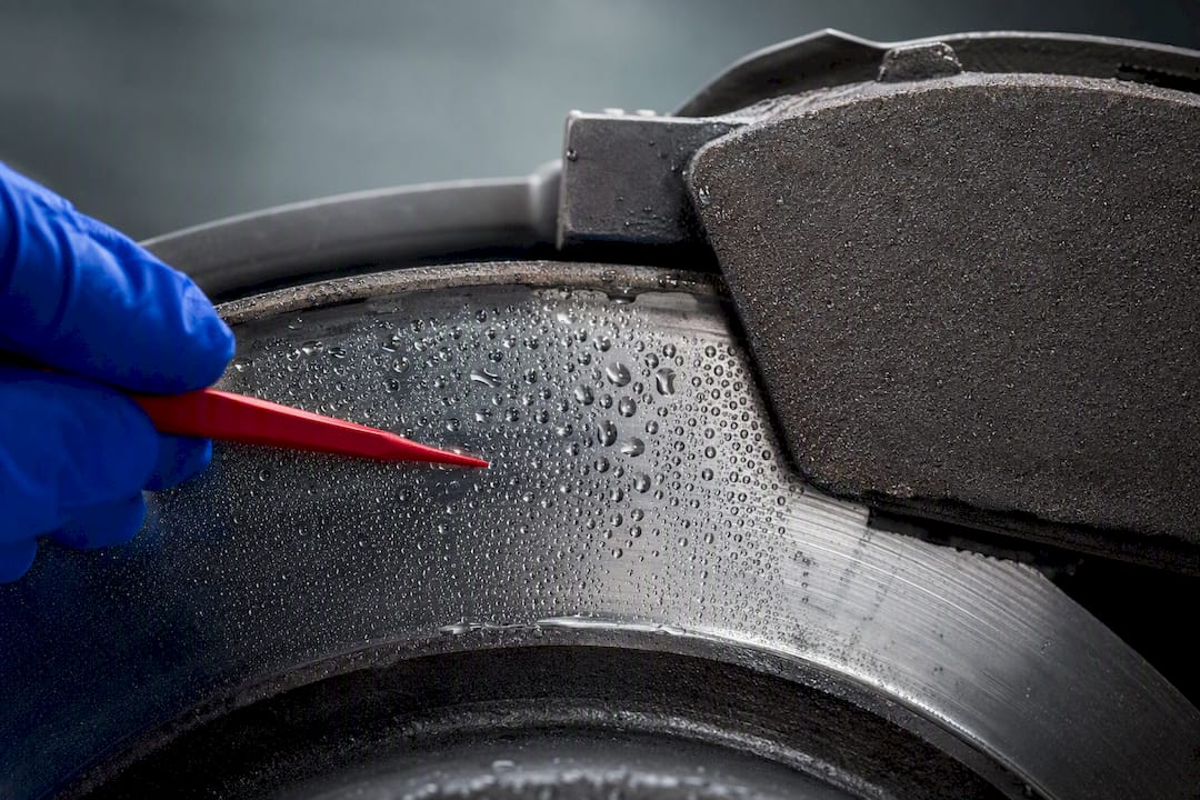 Moisture forming at brake pad rotor interface
