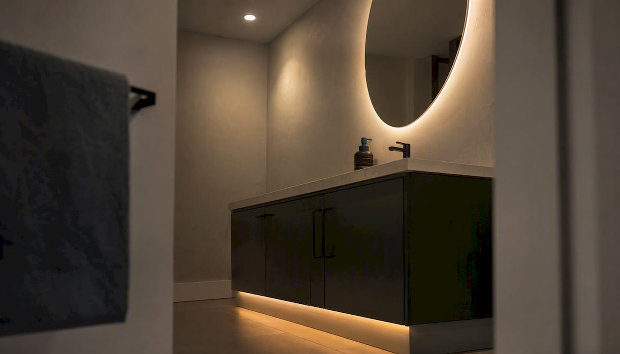 Recessed, backlit mirror, and toe-kick lighting combo