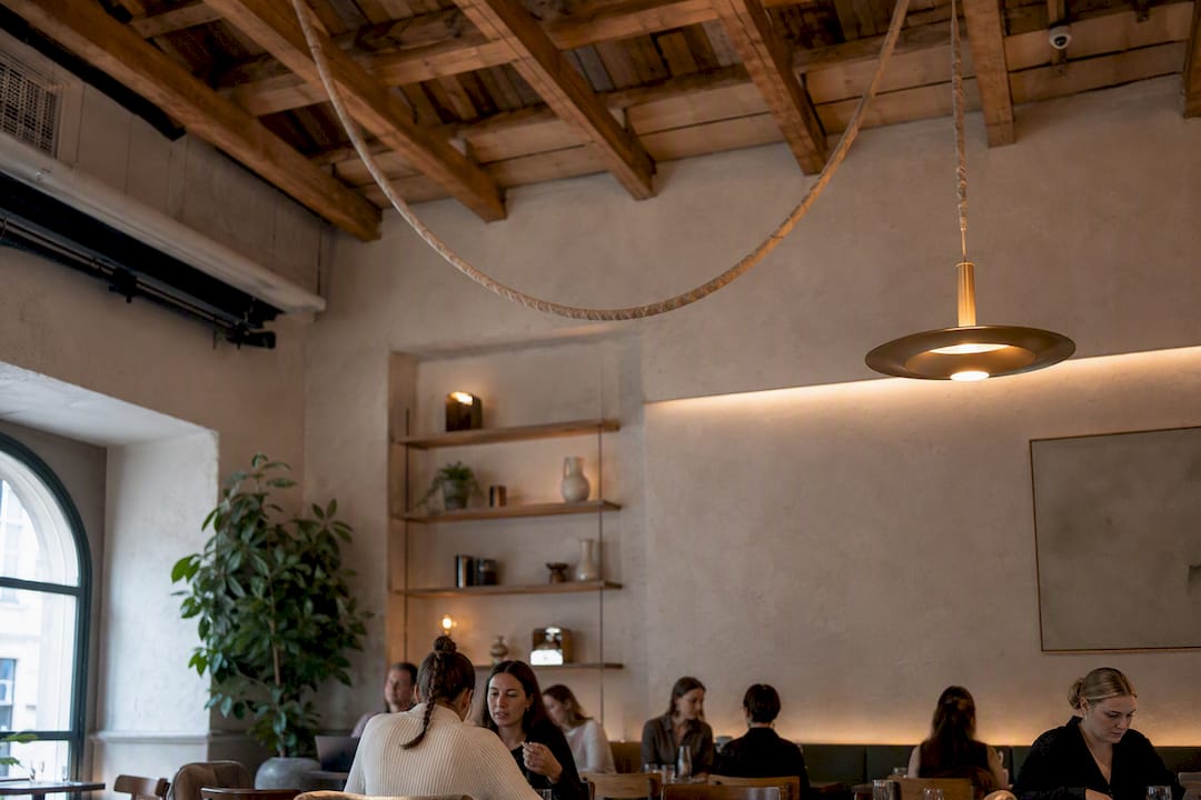 Stylish swagged chandelier with relaxed cord curve