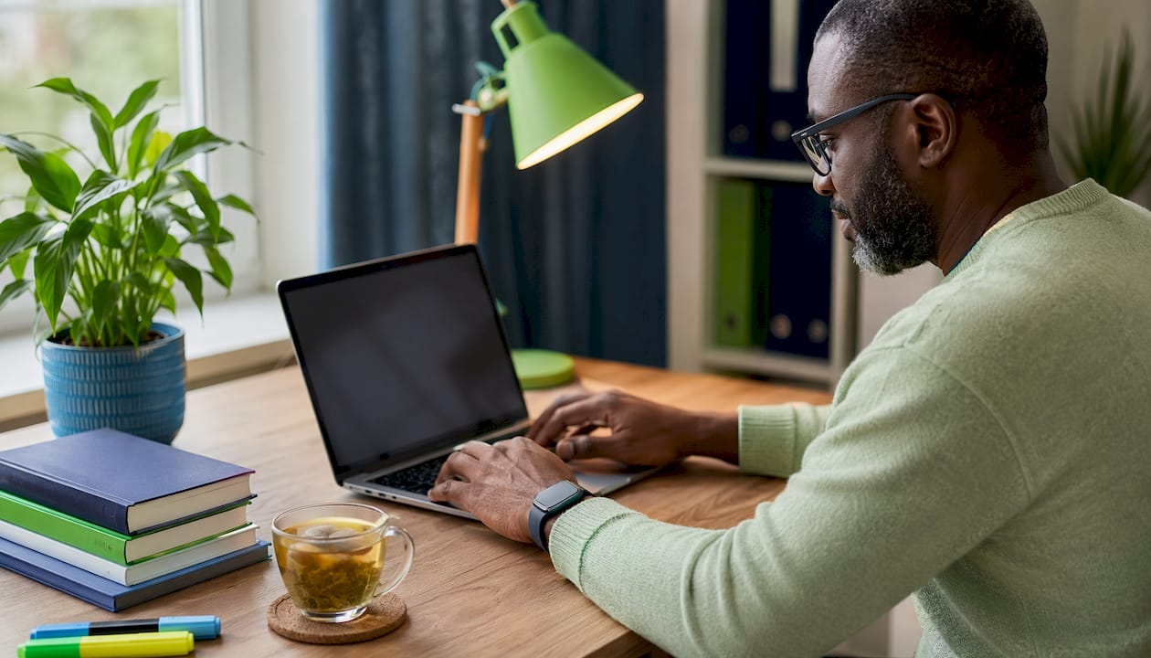 Man registering CRA payroll account online tablet view