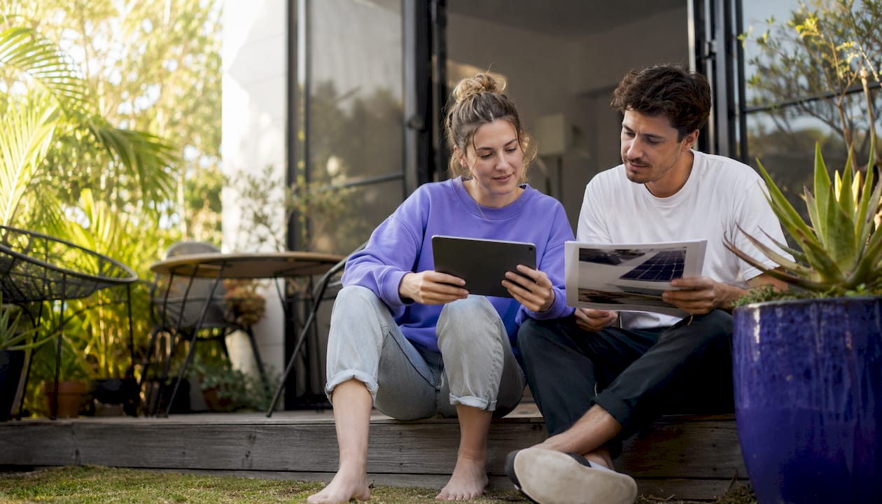 Couple discussing solar lead options at home