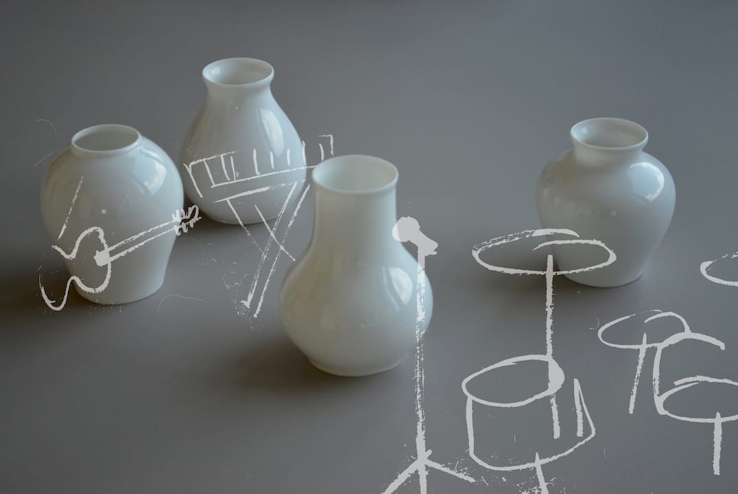 Pouring tea into hand-glazed porcelain teacup