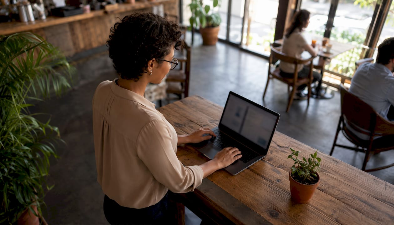 Ecommerce analyst reviewing multi-store dashboard