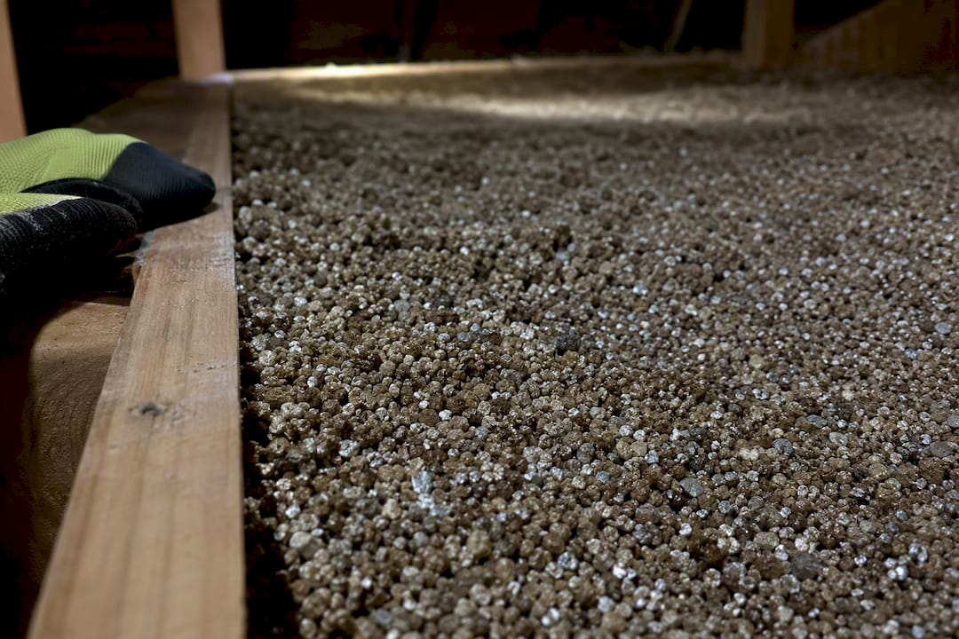 Close-up of suspected vermiculite insulation