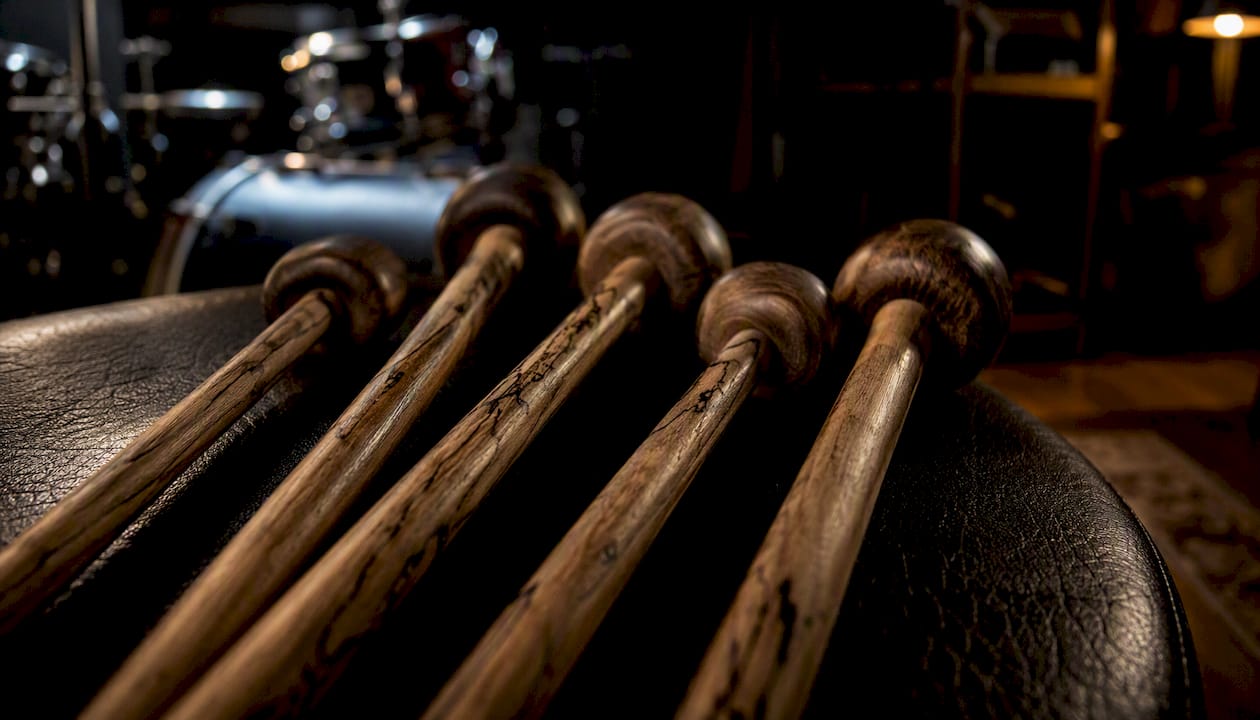 Wood bass drum beaters showing grain and wear