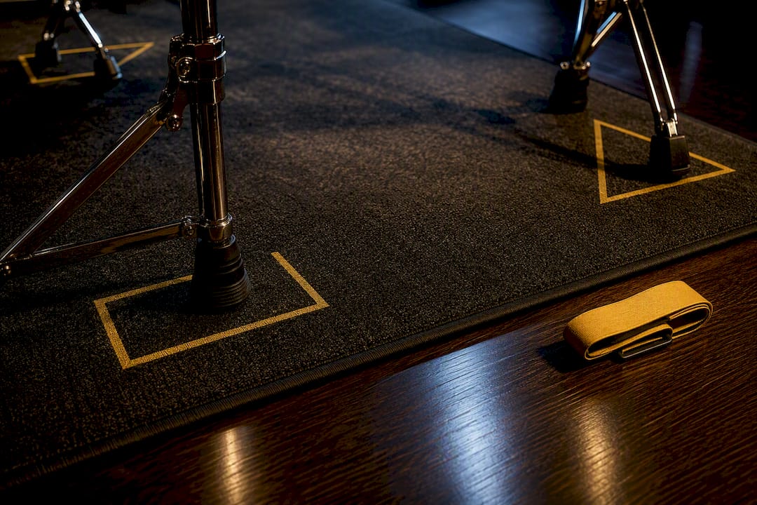 Drum rug holding marked hardware positions