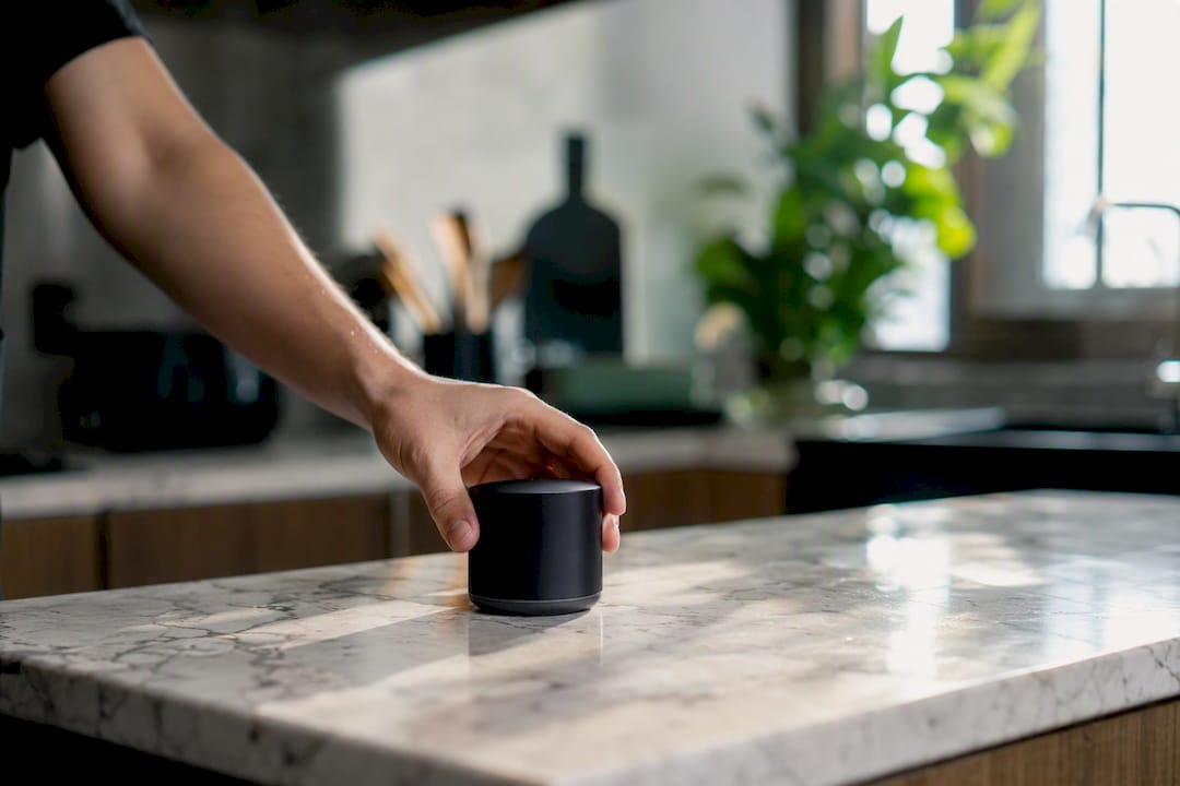 Hand styling product on wooden table