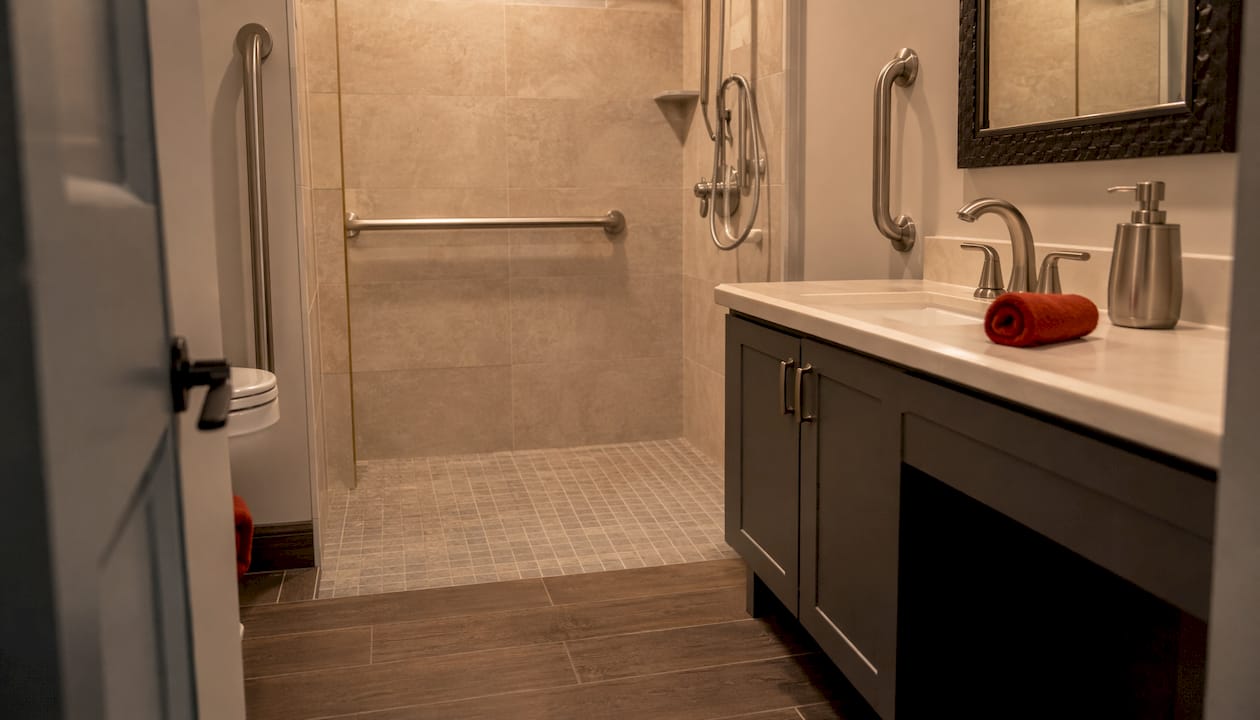 Small bathroom with accessible curbless shower
