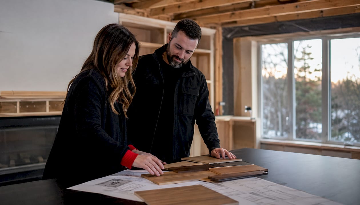 Client and contractor discuss cabinetry options