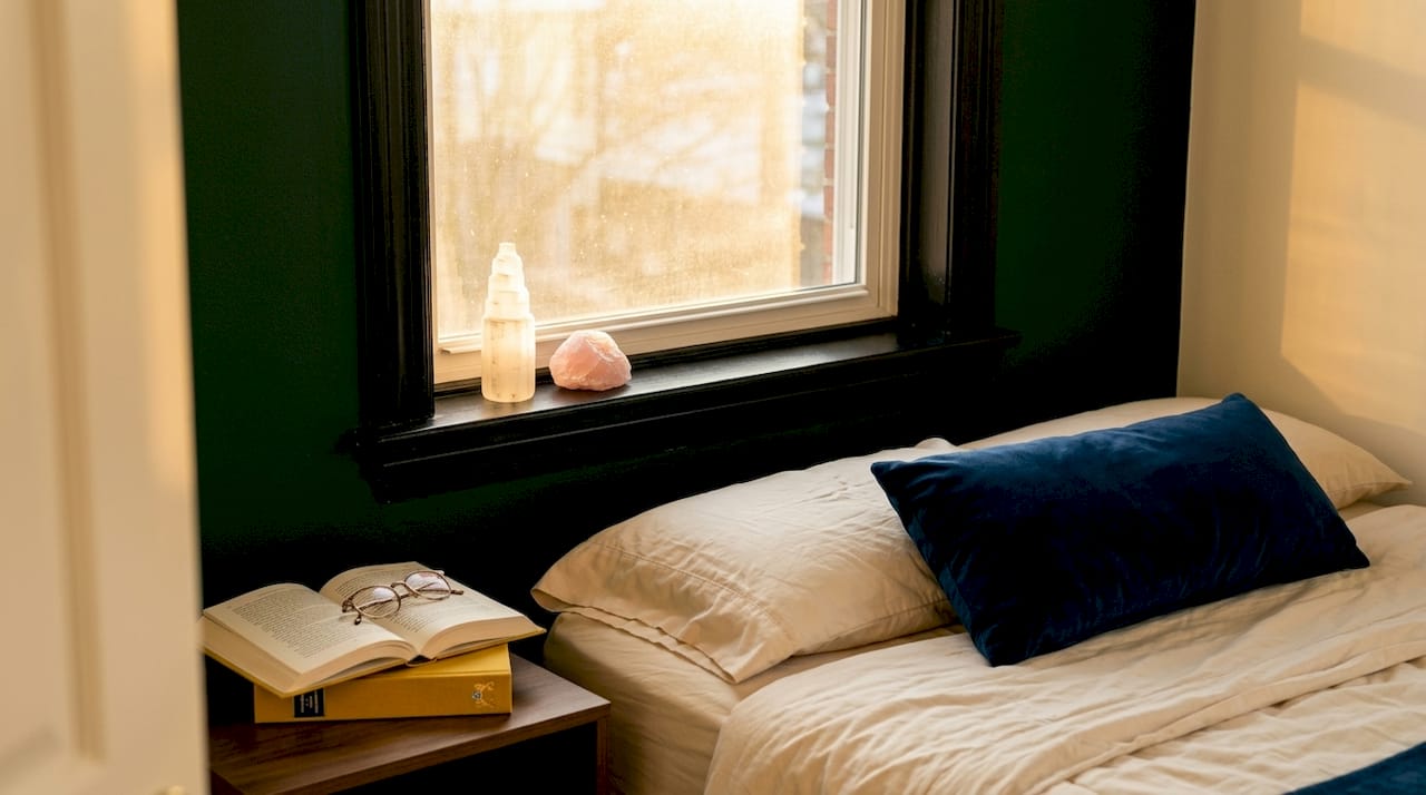 Selenite and rose quartz on bedroom windowsill