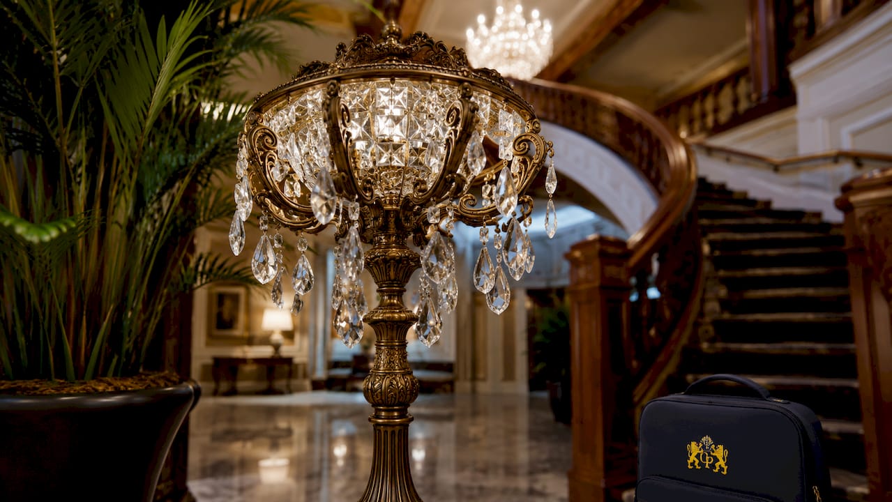 Close-up ornate bronze crystal floor lamp details