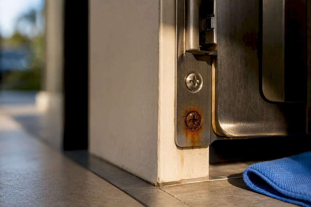 Rust forming around mismatched lock fasteners