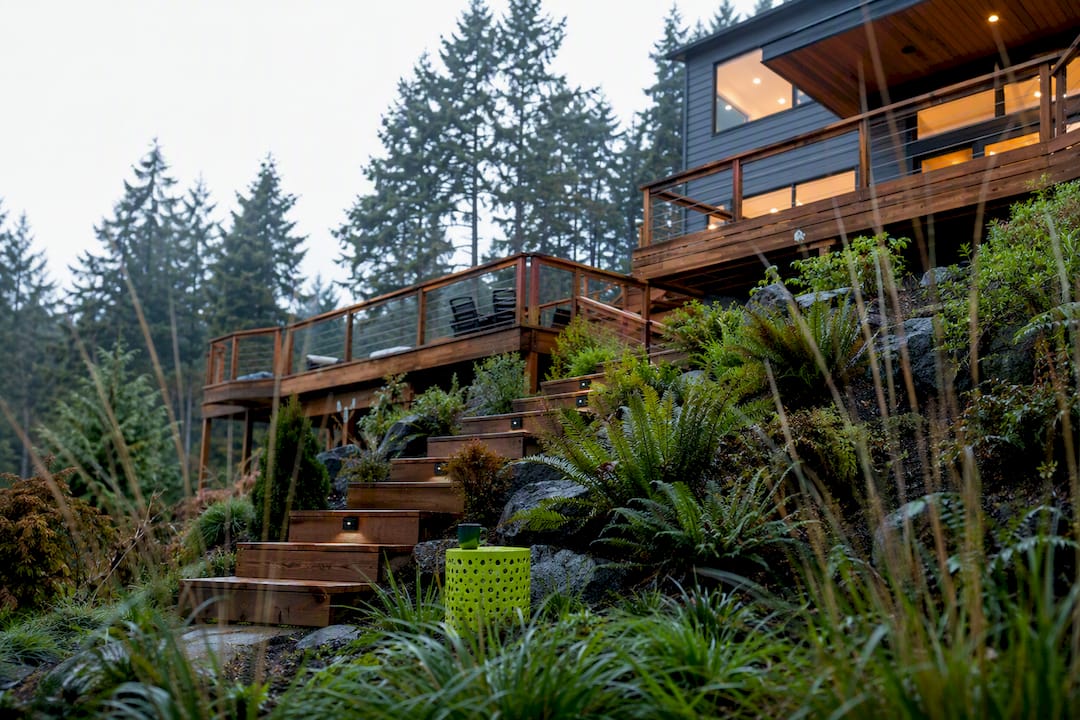 Tiered deck platforms following a sloped backyard