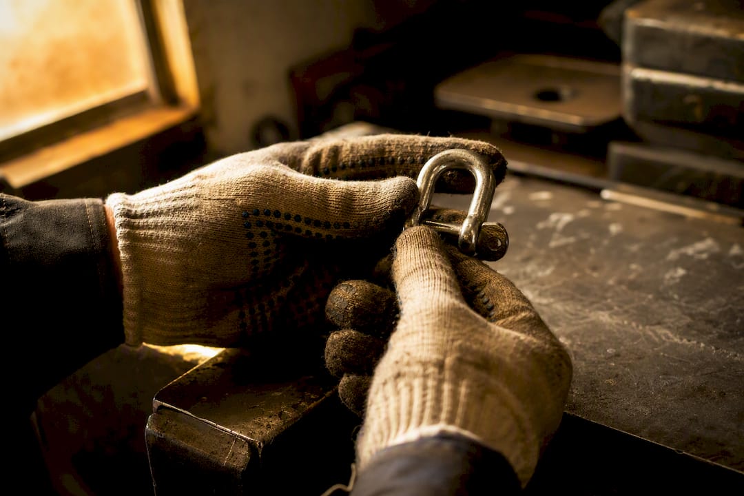 Hands inspecting equipment collateral