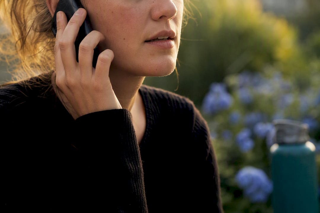 Close-up of a person pausing during phone call