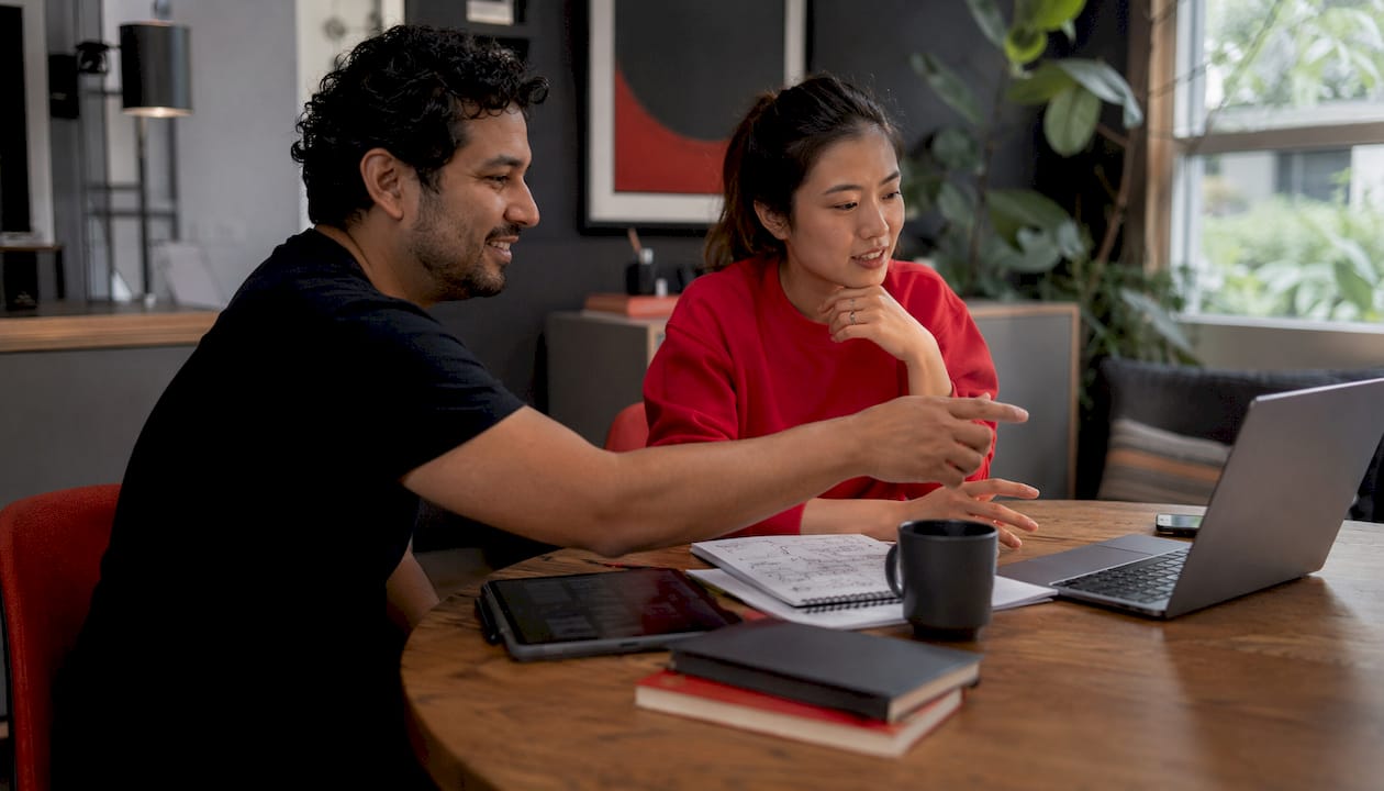 Production team reviewing interview footage
