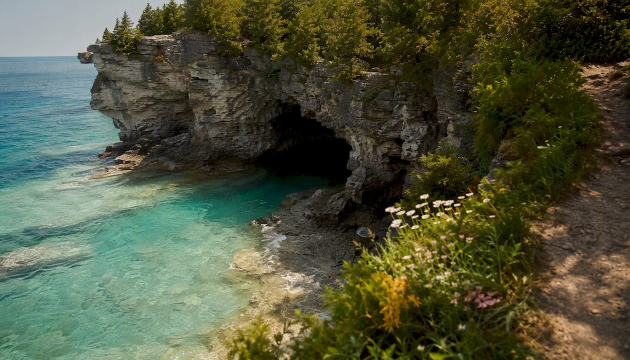 Turquoise water and limestone cliffs at Bruce Peninsula Grotto