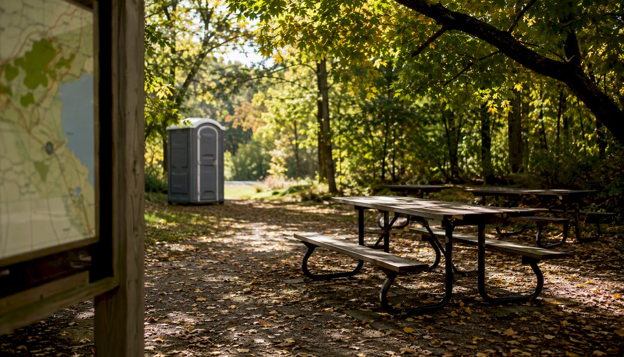 Picnic tables and washrooms at Toronto trailhead
