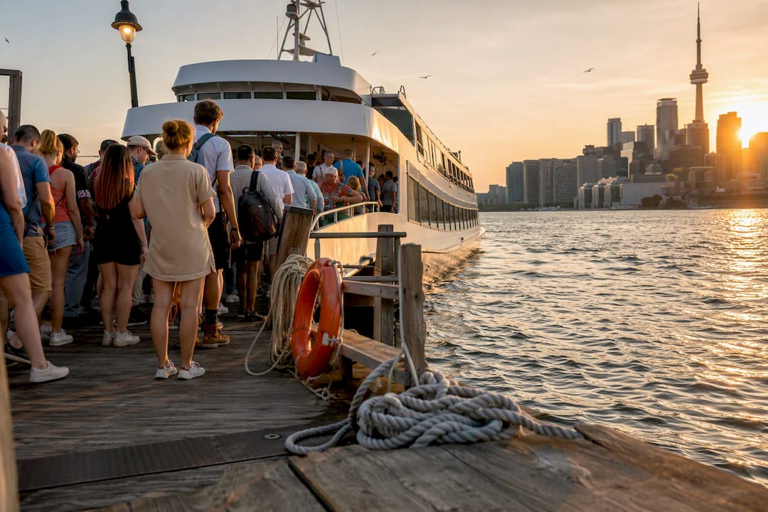 Toronto harbourfront with tour boat boarding