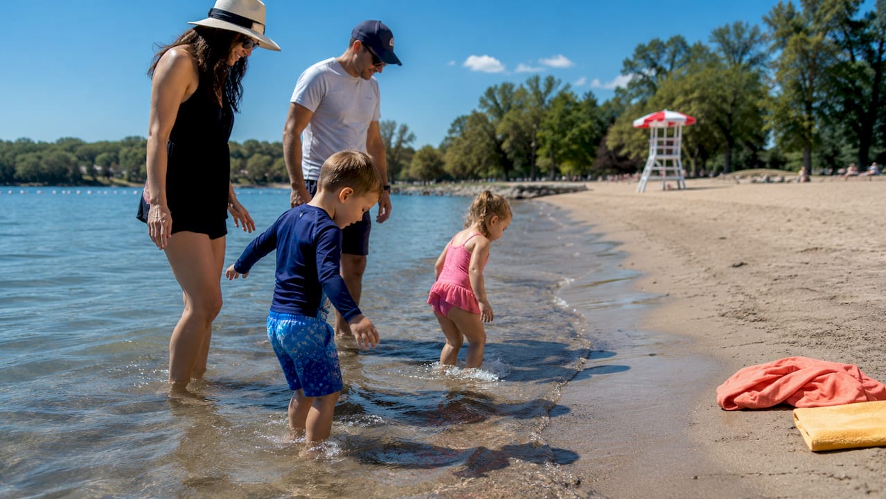 Family wading at Centre Island Beach
